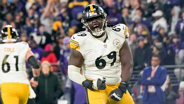 Jan 1, 2023; Baltimore, Maryland, USA; Pittsburgh Steelers guard Kevin Dotson (69) reacts after the team scores a touchdown against the Baltimore Ravens during the second half at M&T Bank Stadium. Mandatory Credit: Jessica Rapfogel-USA TODAY Sports